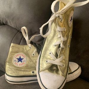 Gold high top converse